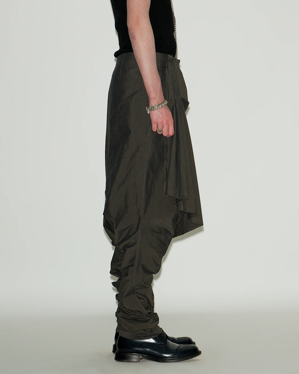 SLIM TROUSERS WITH DRAPED SKIRT