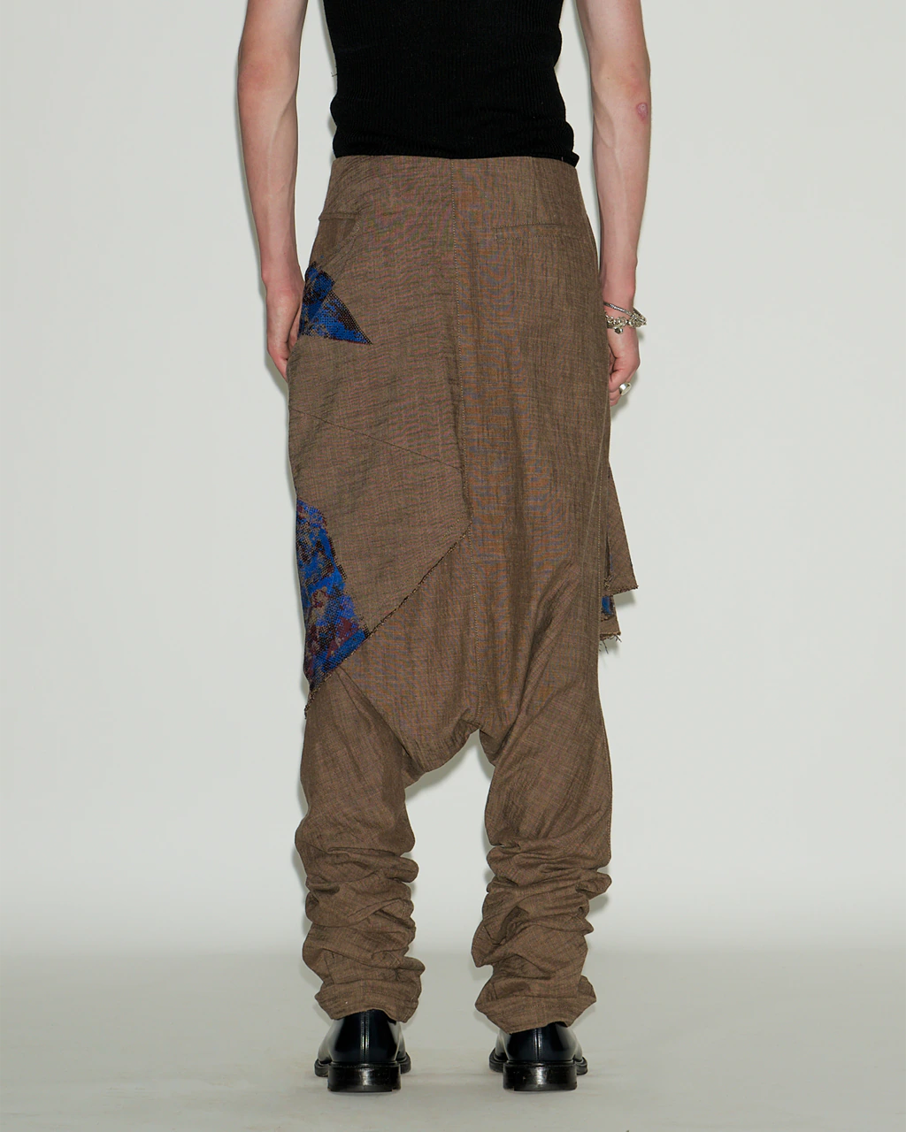 GRAPHIC TROUSERS WITH DRAPED SKIRT
